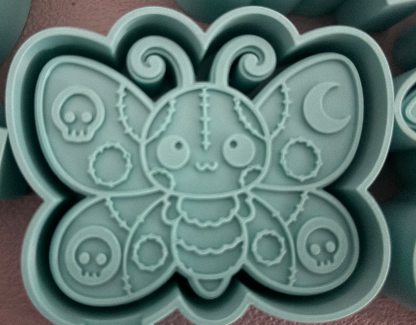 Patchwork moth mold